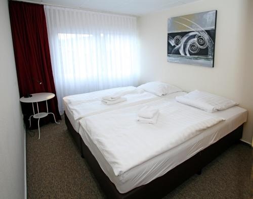 Imagen de la habitación del Appartementanlage Vierjahreszeiten. Foto 9