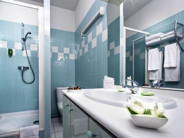 Imagen de la habitación del Apparth&ocirc;tel Privilodges Grenoble Chateau Perrin. Foto 15