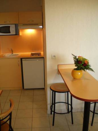 Imagen de la habitación del Apparts Meubl&eacute;s R&eacute;sidence Columba. Foto 8