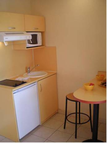 Imagen de la habitación del Apparts Meubl&eacute;s R&eacute;sidence Columba. Foto 14