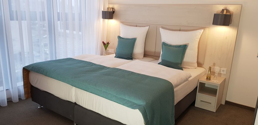 Imagen de la habitación del Apricot Hotel. Foto 9
