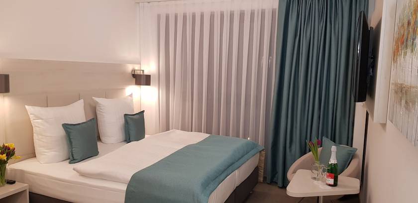 Imagen de la habitación del Apricot Hotel. Foto 16