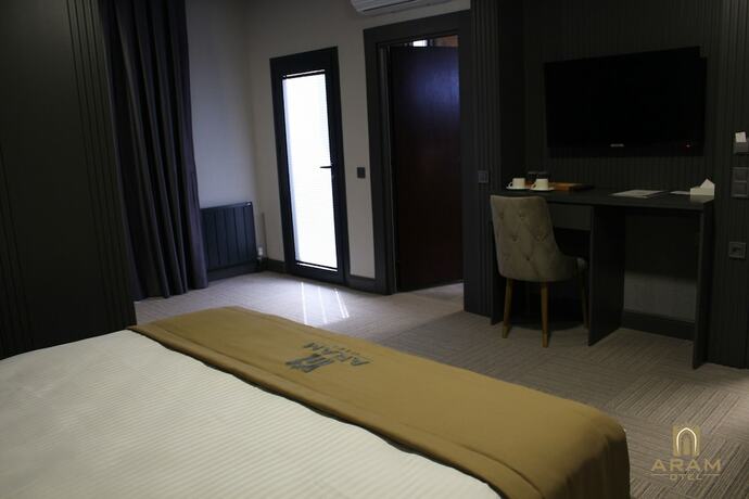 Imagen de la habitación del Aram Otel. Foto 12