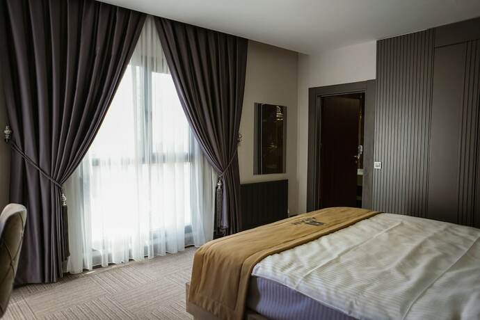 Imagen de la habitación del Aram Otel. Foto 15