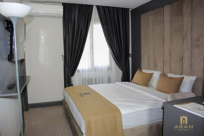 Imagen de la habitación del Aram Otel. Foto 17