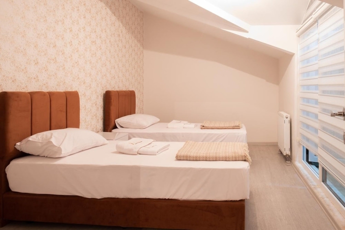 Imagen de la habitación del Araz Suit Otel. Foto 8