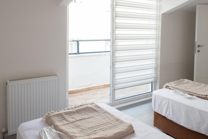 Imagen de la habitación del Araz Suit Otel. Foto 13