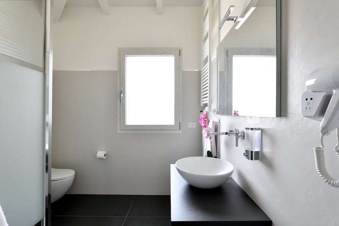 Imagen de la habitación del Arbatax Sa Omu Bianca. Foto 4