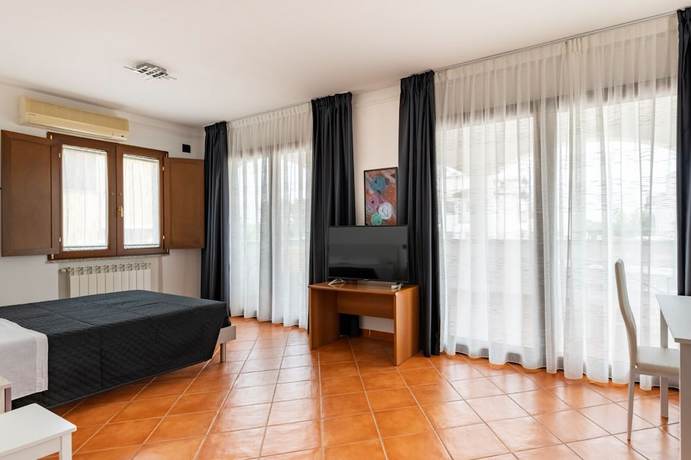 Imagen de la habitación del Arbatax Sa Omu Bianca. Foto 5