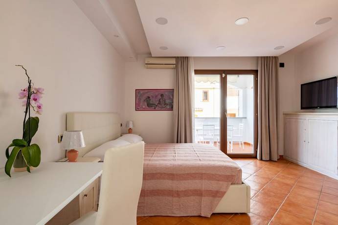 Imagen de la habitación del Arbatax Sa Omu Bianca. Foto 12