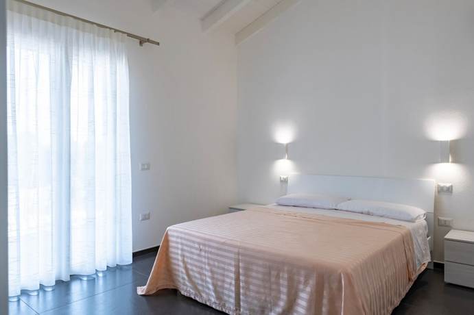 Imagen de la habitación del Arbatax Sa Omu Bianca. Foto 16