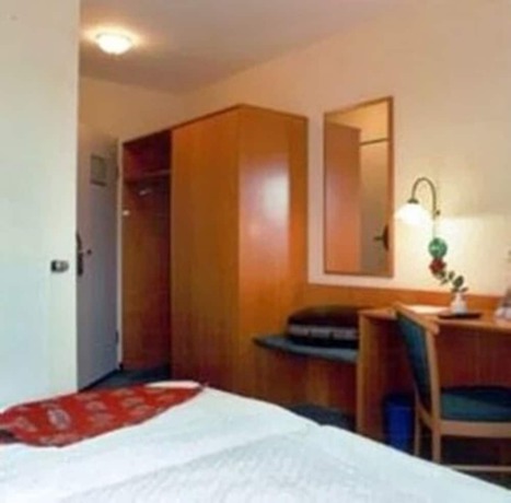 Imagen de la habitación del Arc Hotel. Foto 4