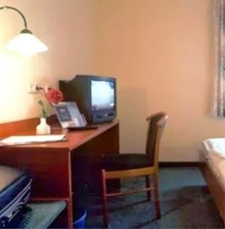 Imagen de la habitación del Arc Hotel. Foto 5