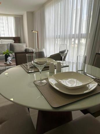 Imagen de la habitación del Arcadia Condo Suites. Foto 12