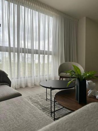 Imagen de la habitación del Arcadia Condo Suites. Foto 13