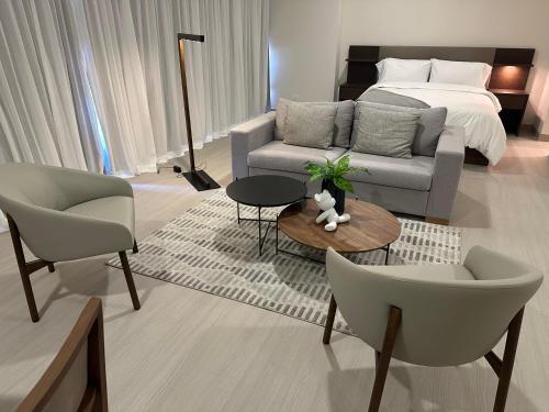 Imagen de la habitación del Arcadia Condo Suites. Foto 14
