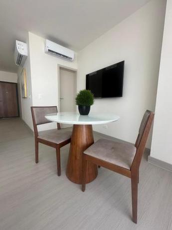 Imagen de la habitación del Arcadia Condo Suites. Foto 15