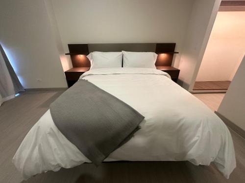 Imagen de la habitación del Arcadia Condo Suites. Foto 17