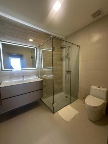 Imagen de la habitación del Arcadia Condo Suites. Foto 20