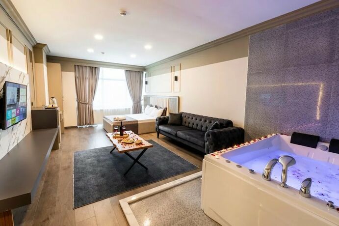 Imagen de la habitación del Arena Luxury Hotel. Foto 10