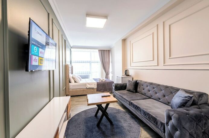 Imagen de la habitación del Arena Luxury Hotel. Foto 14