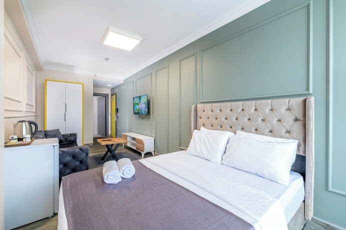 Imagen de la habitación del Arena Luxury Hotel. Foto 15