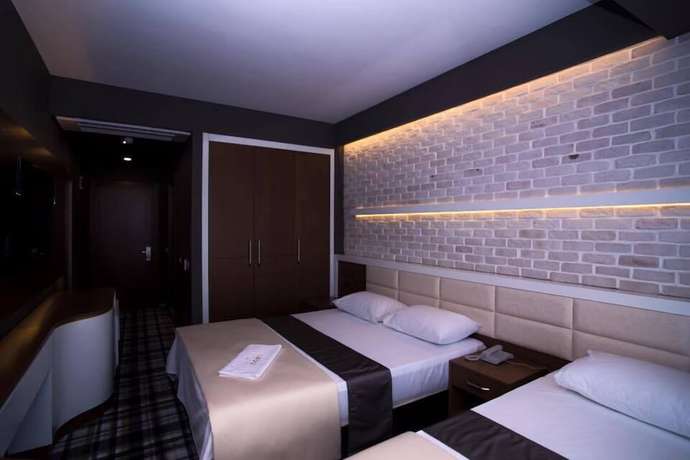 Imagen de la habitación del Aripsas Hotel. Foto 7