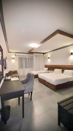 Imagen de la habitación del Armaan Suites and Restaurant. Foto 12