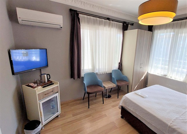 Imagen de la habitación del Armoni City Hotel. Foto 16