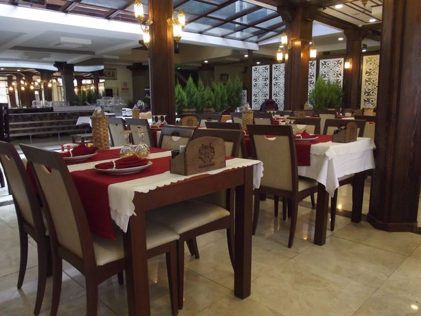 Imagen del bar/restaurante del Arslanlar Konağı Hotel. Foto 5