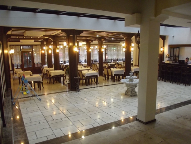 Imagen del bar/restaurante del Arslanlar Konağı Hotel. Foto 9