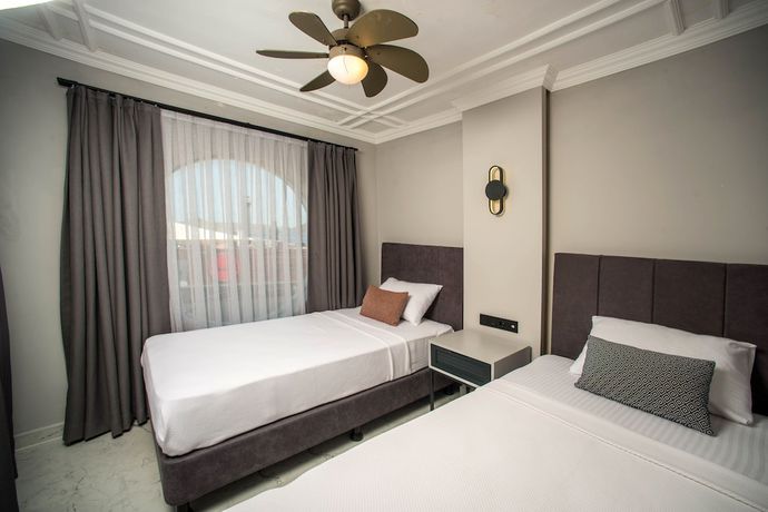 Imagen de la habitación del Art Suites Hotel Bodrum. Foto 10