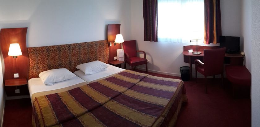 Imagen de la habitación del Art&eacute;mis H&ocirc;tel and Spa Bistro Coquet. Foto 6