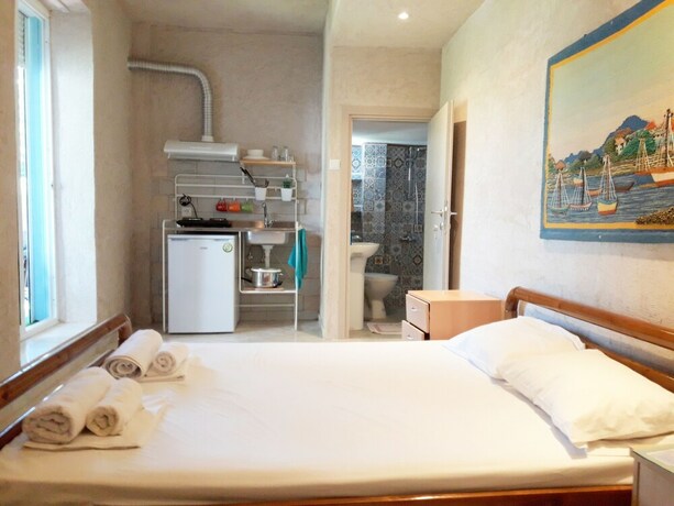 Imagen de la habitación del Artemis Studios & Apartments. Foto 17