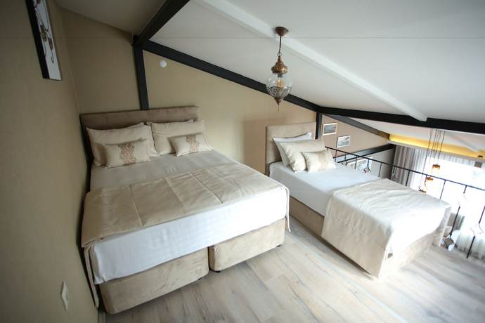 Imagen de la habitación del Artist Rooms Suites. Foto 9
