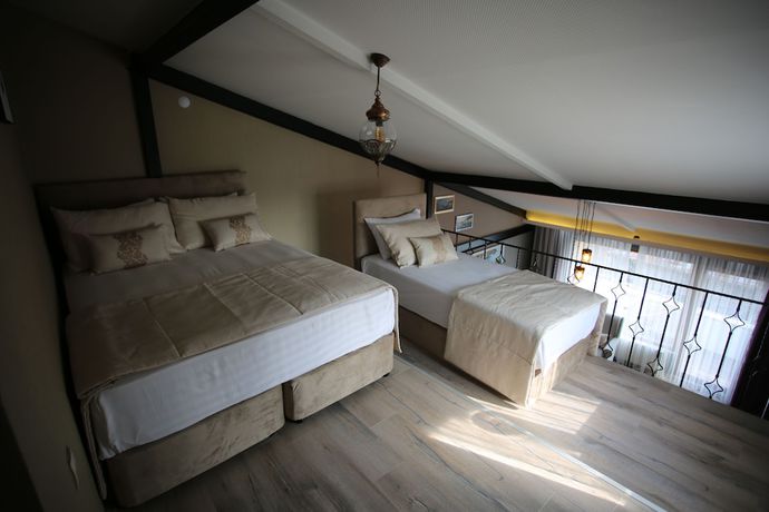 Imagen de la habitación del Artist Rooms Suites. Foto 11