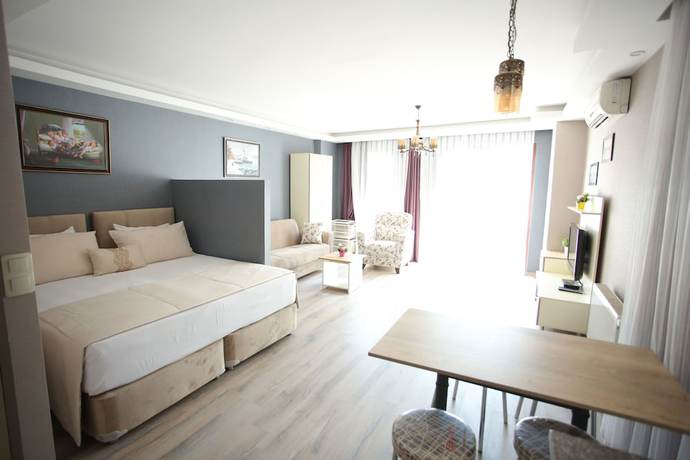 Imagen de la habitación del Artist Rooms Suites. Foto 17