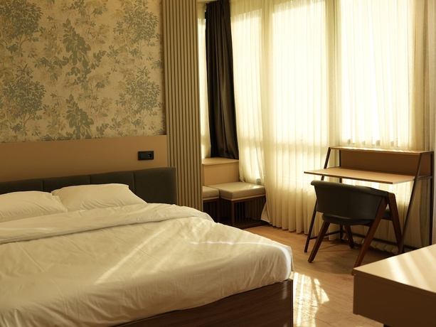 Imagen de la habitación del Arun Suites. Foto 1