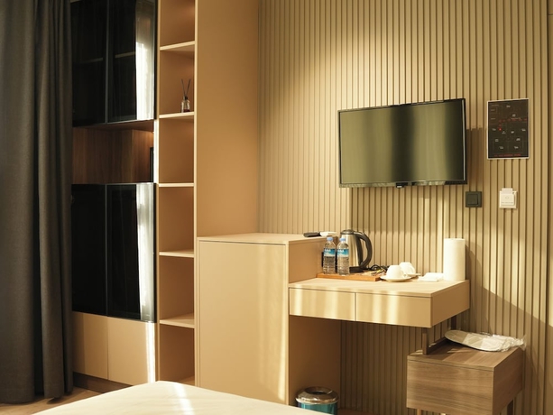 Imagen de la habitación del Arun Suites. Foto 2