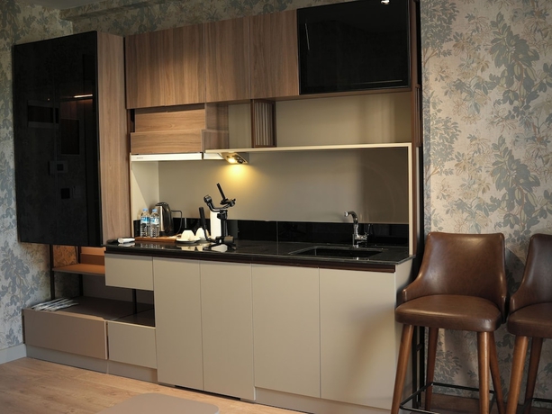 Imagen de la habitación del Arun Suites. Foto 4