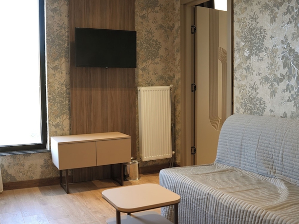 Imagen de la habitación del Arun Suites. Foto 6