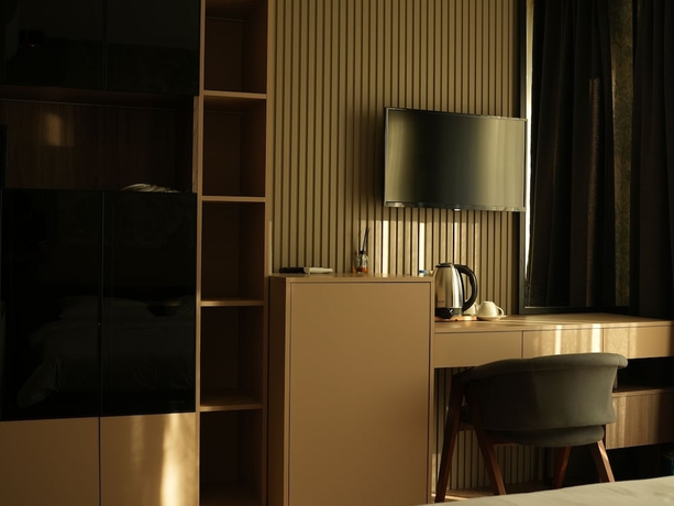 Imagen de la habitación del Arun Suites. Foto 8