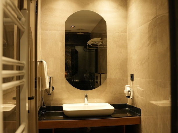 Imagen de la habitación del Arun Suites. Foto 9