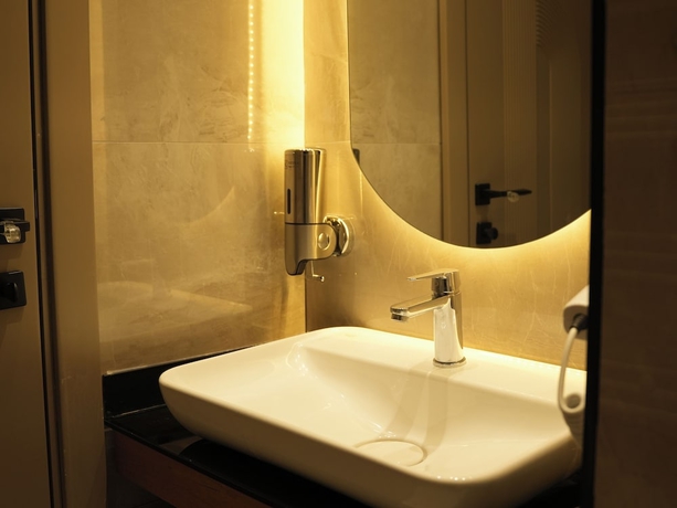 Imagen de la habitación del Arun Suites. Foto 10