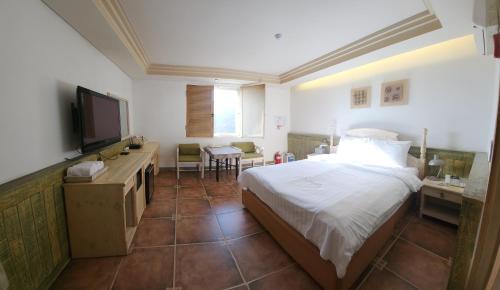 Imagen de la habitación del Asan Paradise. Foto 19