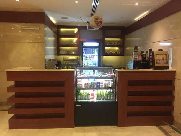 Imagen del bar/restaurante del Asfar Plaza Hotel and Apartments. Foto 4