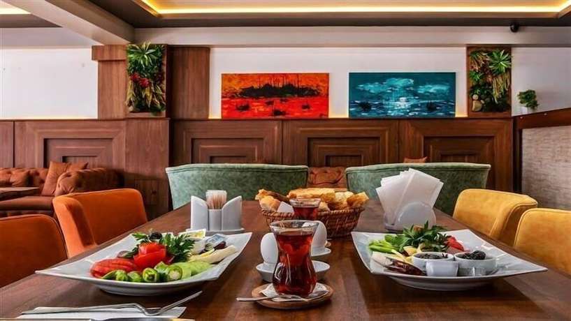 Imagen del bar/restaurante del Asia Business Suites. Foto 2