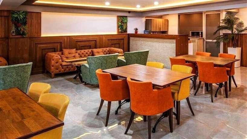 Imagen del bar/restaurante del Asia Business Suites. Foto 3