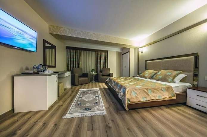 Imagen de la habitación del Asia Business Suites. Foto 15