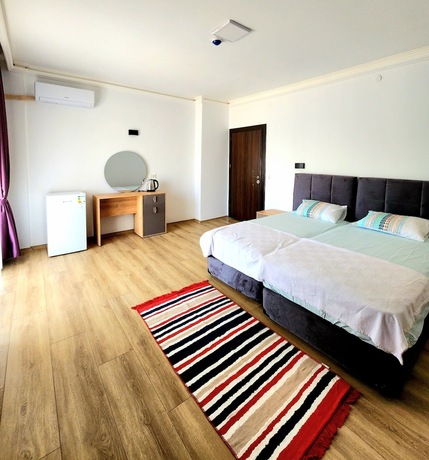 Imagen de la habitación del Asimado Suit Hotel. Foto 11